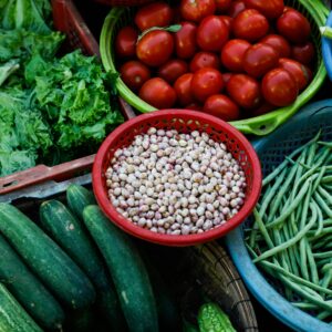 Vibrant assortment of fresh vegetables at a local Vietnamese market.